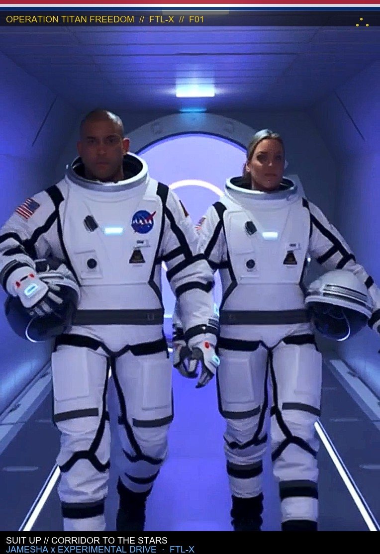 Commander and Night Shade walking the suit-up corridor in white NASA-style EVA suits